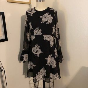 Fit and flare black floral dress. Gently worn